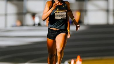 Chioma Nwachukwu powers through the final stretch of the 400m race at the Tom Jones Invitational, approaching the finish line.