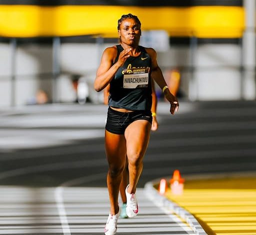 Chioma Nwachukwu powers through the final stretch of the 400m race at the Tom Jones Invitational, approaching the finish line.