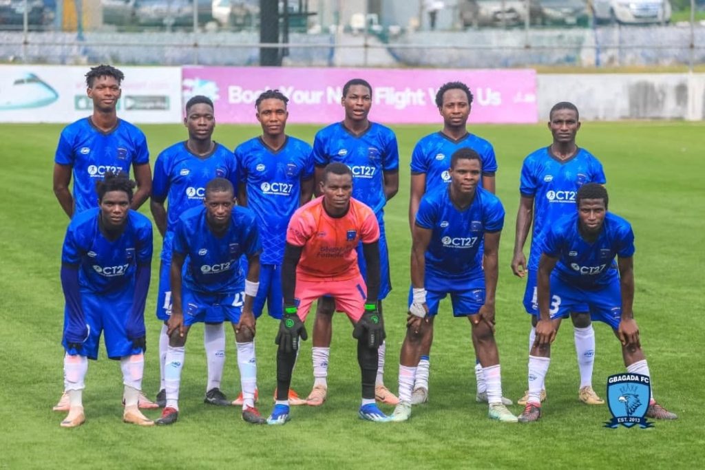 bagada United players lined up before kickoff in a TCC League match against Dannaz FC, wearing their traditional blue kits and showing unity ahead of a crucial fixture.