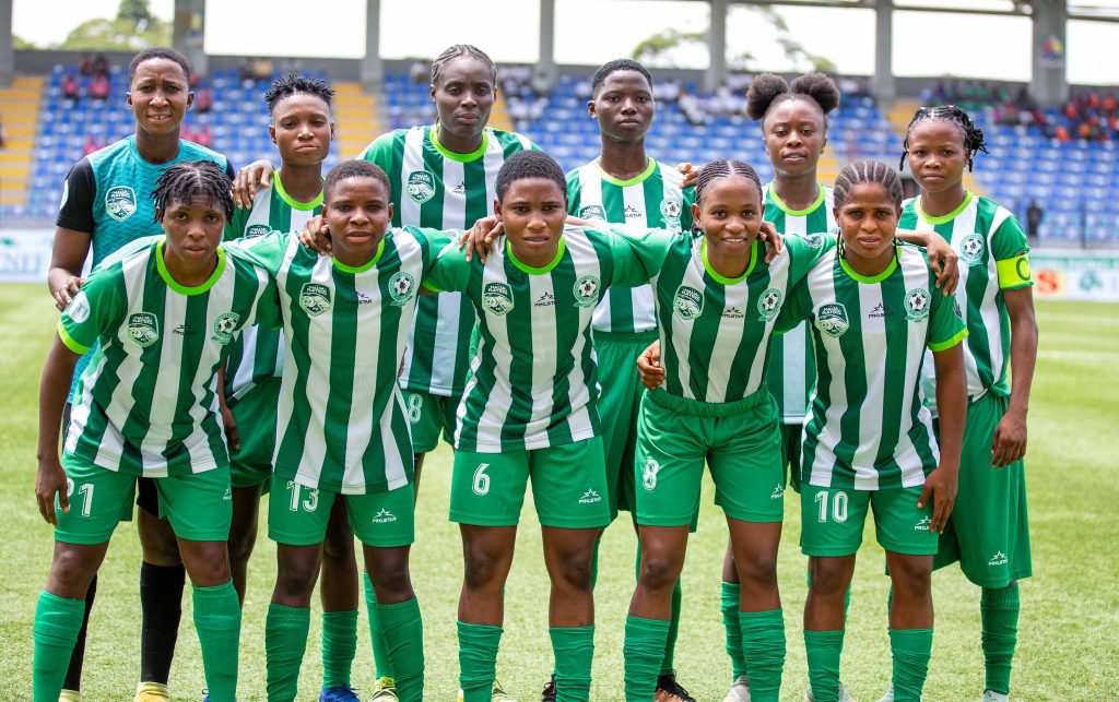 Naija Ratels players pose for a team photo before their crucial NWFL Matchday 13 clash against Delta Queens in Uyo