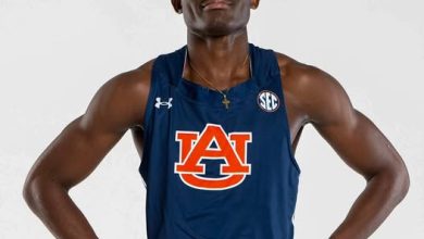 Israel Okon poses confidently for a photo after winning his 100m heat with a personal best of 10.07s at the Tom Jones Memorial in Florida.