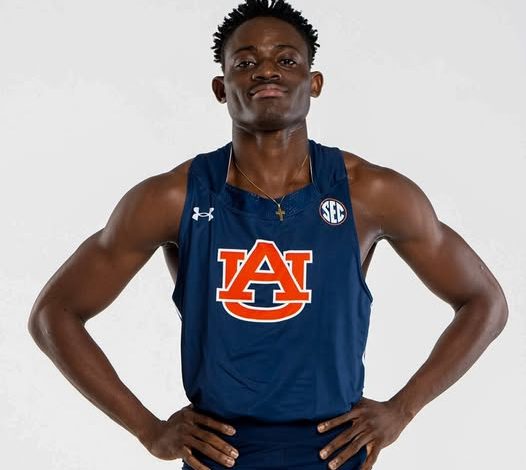 Israel Okon poses confidently for a photo after winning his 100m heat with a personal best of 10.07s at the Tom Jones Memorial in Florida.
