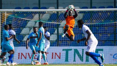 Shooting Stars goalkeeper makes a crucial save during a tense moment in the penalty area against Remo Stars.