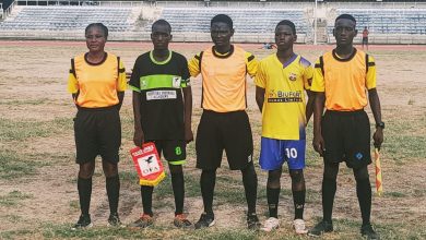 Captains of Olufunke FC and Starlight FA pose with match officials before kickoff at the LSFA U-15 League 2024 boys' final inside the National Stadium Surulere, Lagos.