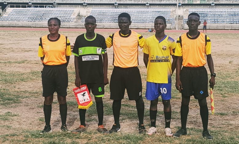 Captains of Olufunke FC and Starlight FA pose with match officials before kickoff at the LSFA U-15 League 2024 boys' final inside the National Stadium Surulere, Lagos.