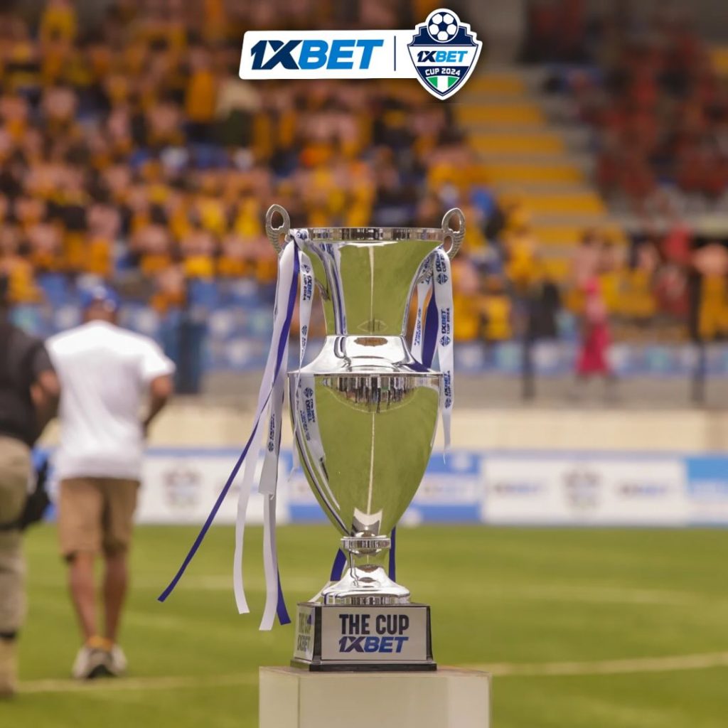 1xCup Trophy 2025 shining under the stadium lights, symbolizing victory in Nigerian grassroots football.