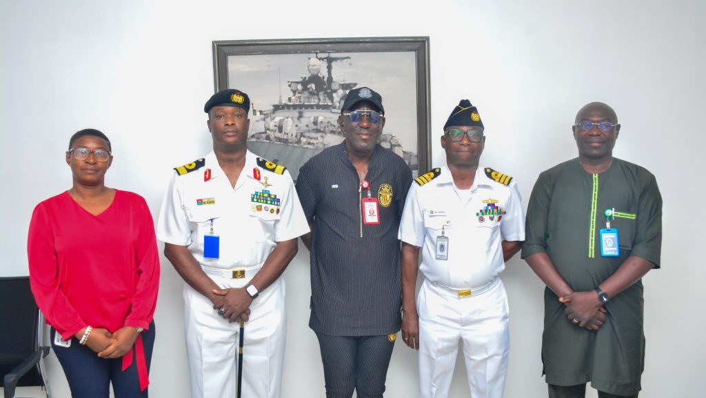 Hon. Adeboye Adeyinka and Admiral James Kilby pose with Nigeria Armwrestling Federation delegation after strategic meeting at Nigerian Navy Headquarters.