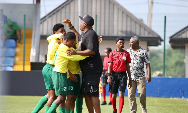 Naija Ratels players celebrate their opening goal with Coach Samson Keshi at the touchline during NWFL Super 6 match against Nasarawa Amazons.