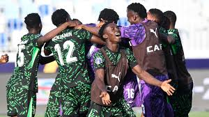 Flying Eagles vs South Africa: U-20 AFCON 2025 Semi-Final Preview, Kickoff Time, Venue & World Cup Qualification The Flying Eagles celebrate their victory after a thrilling penalty shootout win against Senegal in the U-20 AFCON quarter-final, showing joy and relief as teammates embrace each other.