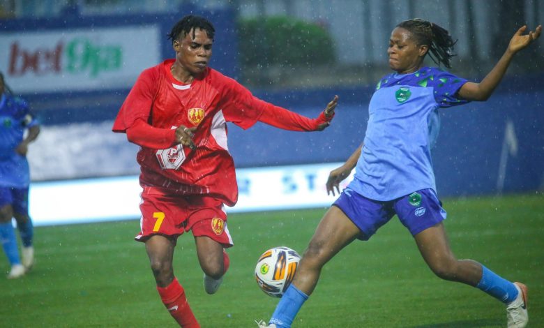 Two players from Nasarawa Amazons and Edo Queens fiercely battle for possession of the ball during their NWFL Super 6 fixture at Remo Stars Stadium in Ikenne.