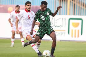 Nigeria’s Flying Eagles Launch U-20 AFCON 2025 Campaign with Hard-Fought Win Over Tunisia Auwal Ibrahim of Nigeria's Flying Eagles dribbles past Tunisia’s Allela during the U-20 AFCON 2025 match at Cairo International Stadium