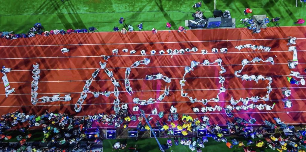 Lagos Lights Up Gateway Games 2025: A Bold Statement of Sporting Excellence Lagos State athletes in vibrant uniforms performing a colorful display at the Gateway Games 2025 Opening Ceremony in Abeokuta