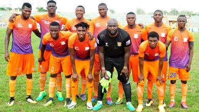 Sunshine Stars players lined up before their match against Niger Tornadoes in the NPFL, ready for action on the pitch.