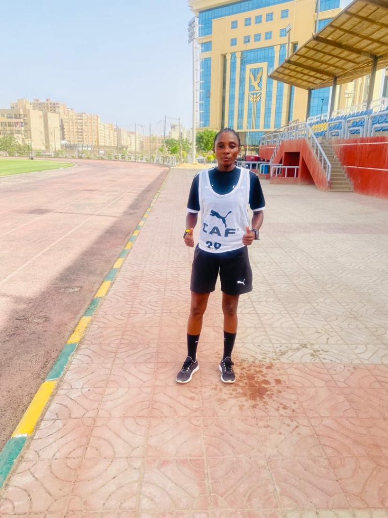 Yemisi Akintoye poses confidently after completing her CAF Elite A fitness test for WAFCON 2025 in Cairo.
