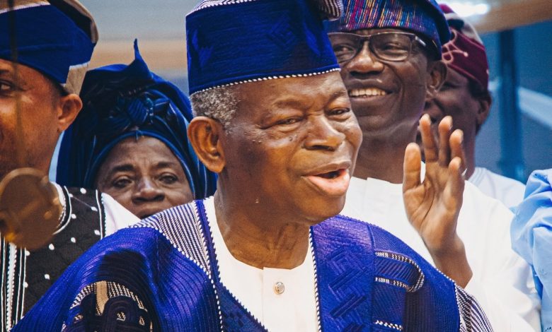 Pastor Elijah Oludele Abina dancing joyfully at his 90th birthday celebration surrounded by church members