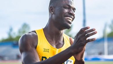 Ezekiel Nathaniel celebrates after winning the 400m hurdles at the NCAA Championships with a time of 47.49 seconds, setting a new Nigerian national record.