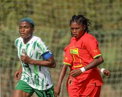 Super Falcons Outclass Black Queens in Jollof Derby With 3-1 Victory Rasheedat Ajibade-The Super Falcons captain with a Black Queens defender