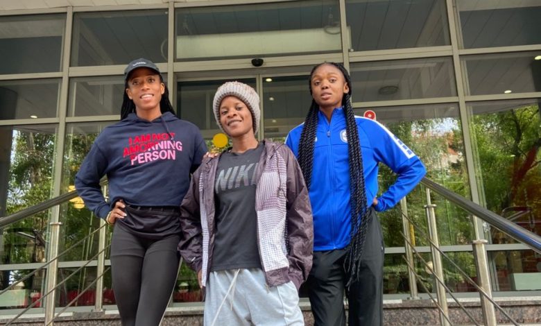 Nigerian athletics Sophia Efetobore, Faith Osamuyi, and Ronke Akanbi pose together, showcasing determination ahead of their international competition in Moscow.
