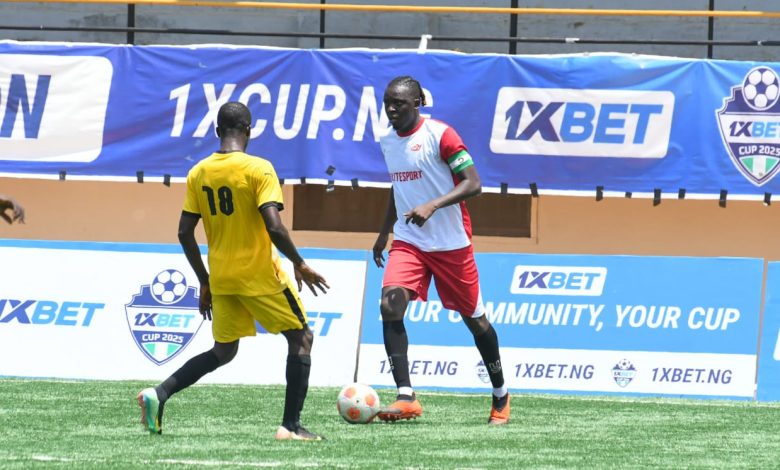 Akpororo attempting to dribble past a defender during 1XBet Matchday 4 football match at Inspire Sports Arena in Lagos