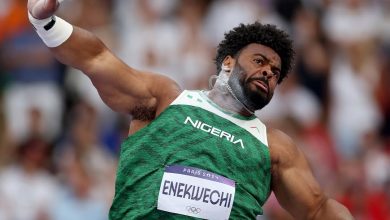 Chukwuebuka Enekwechi launches a powerful shot put throw during the Eugene Diamond League, setting a new African record of 22.10 metres.