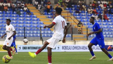 Ikorodu City players challenge Shooting Stars attackers during a tense match in the Eko International Preseason Tournament at Mobolaji Johnson Arena
