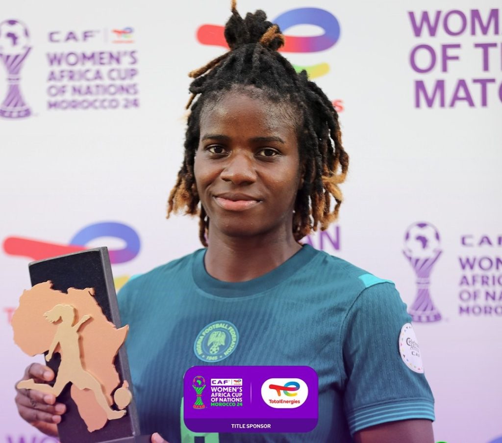 Esther Okoronkwo Shines Bright in Second Half as Nigeria Overpowers Tunisia in WAFCON Clash Esther Okoronkwo holding MVP award after Nigeria's WAFCON 2025 victory over Tunisia