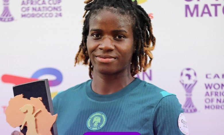 Esther Okoronkwo holding MVP award after Nigeria's WAFCON 2025 victory over Tunisia