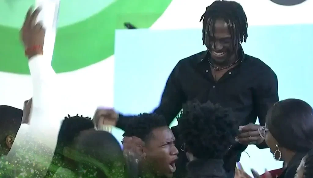 Members of Team Meat-Based Diet lifting Faith in celebration after winning the BBNaija wager challenge.