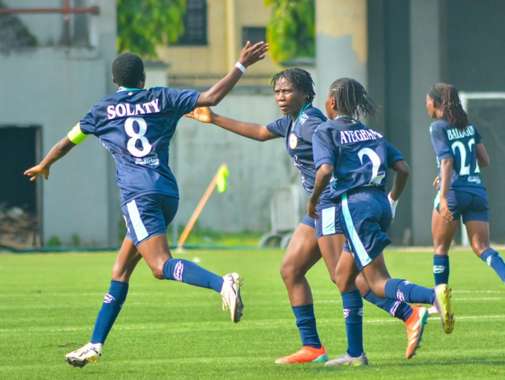 Slaty Fatimoh celebrating her goal.