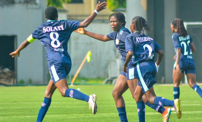 Slaty Fatimoh celebrating her goal.